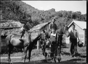 Maori child on horseback