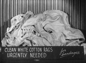 For a (poster?), urging the public to donate cotton rags for World War 2 bandages