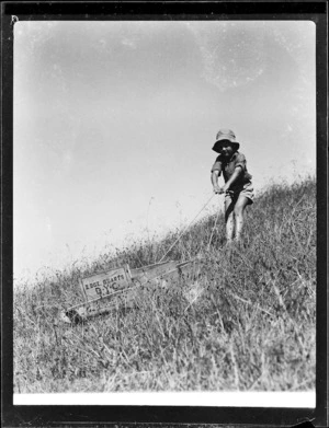 Robert Wells pulling grass sled uphill
