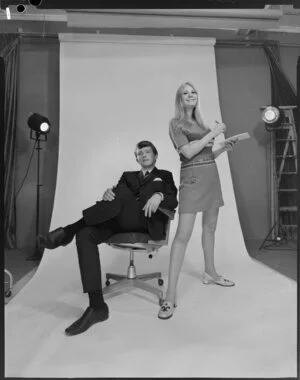 J.I.W., man & woman posing in studio