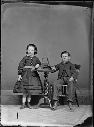 Unidentified boy and girl, probably brother and sister