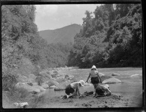 Children playing on the river bank, Mangamahu