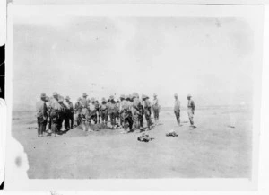 Burying of Pat Gardiner, Sergeant Noalen and two other Auckland Mounted Rifles soldiers killed in a fight at the bridghead, Palestine, during World War I