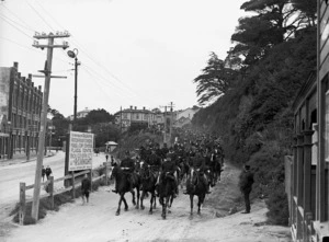 Police leading protesters down Tinakori Road to Thorndon Quay, Wellington, during the 1913 waterfront strike