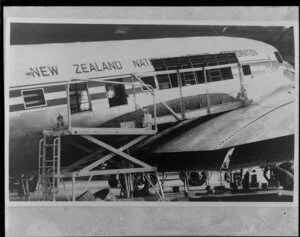 Repairs being carried out on plane exterior