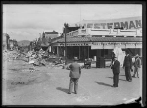 Governor-General Lord Bledisloe photographing earthquake damage in Heretaunga Street, Hastings