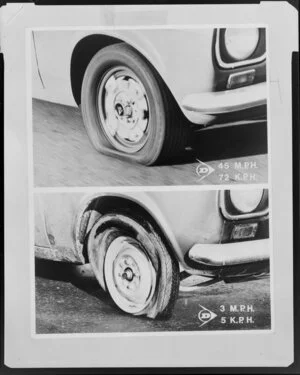 Kenyon, Brand & Riggs flat tyre on moving vehicle