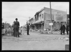 Governor-General Lord Bledisloe photographing earthquake damage in Heretaunga Street, Hastings