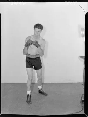 Barry Brown, boxer, posing for the front cover of Sports Post