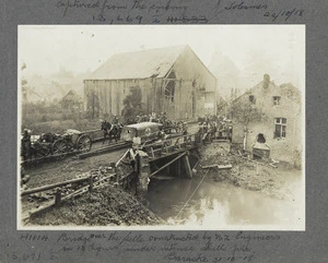 Scene in Barastre, France, during World War I, showing a bridge over the Selle river, built by New Zealanders