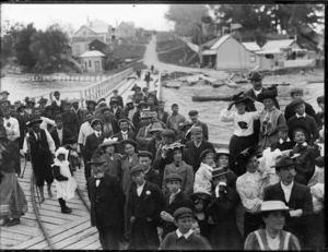Group of people on the wharf, Rawene