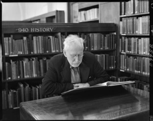 Man reading in the History section of Wellington Central Library - Photograph taken by W Wilson