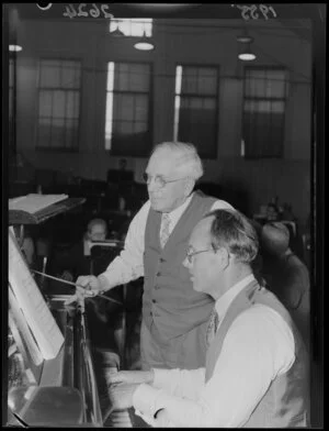 National Orchestra conductor James Robertson at the piano with Stanley Oliver