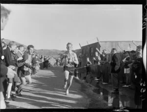 H Barton winning the race for the Scottish harriers team in the Shaw Baton relay, Wellington