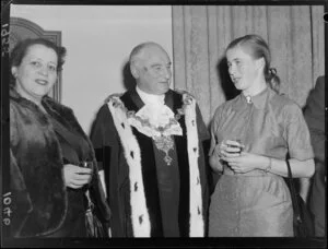 The Mayor of Wellington Robert Macalister with two unidentified women who have taken the Oath of Allegiance at a naturalisation ceremony
