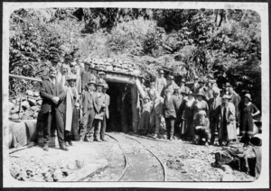 Group in Wainuiomata at the opening of a tunnel housing the Wainuiomata-Orongorongo water pipe