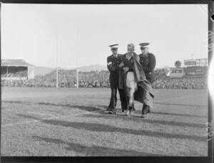 St John staff assisting an injured Wellington player off the field during a Ranfurly Shield match between Wellington and Canterbury, Athletic Park, Wellington