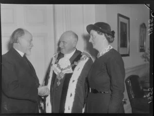 Mayor R L Macalister with an unidentified man and woman during the naturalization ceremony, Wellington