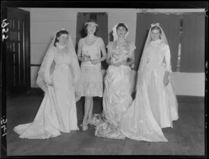 Four women in bridal gowns of different historical periods