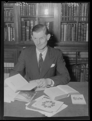 Mr Tony Murray-Oliver, of the Alexander Turnbull Library, with a selection of books on food, and rare books