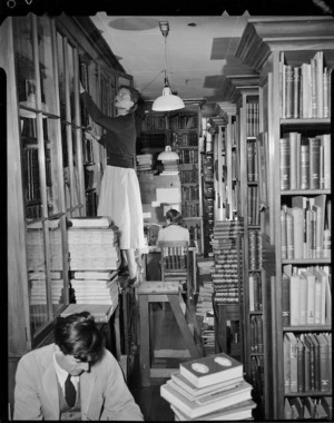 Pacific stack room, and staff, Alexander Turnbull Library, Bowen Street, Wellington