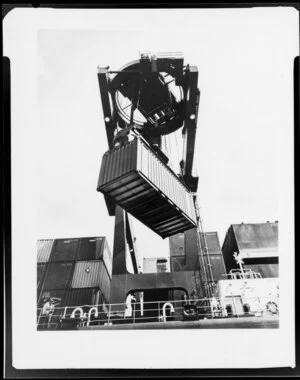 Ship being loaded with containers