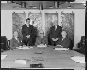 Board portrait of five men