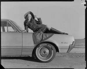 Woman lounging on vista cruiser car with C49 tyres