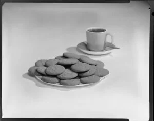 Plate of gingernuts with cup of tea