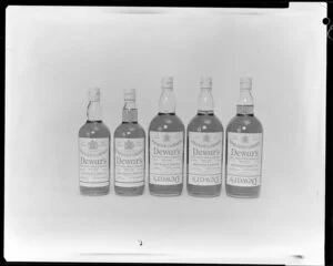 Bottles of Dewar's whiskey in a row