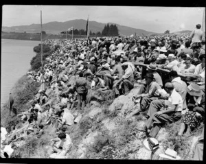 Crowd watching the rowing at 1950 British Empire Games, Lake Karapiro