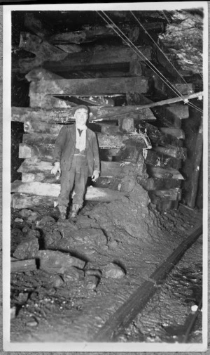 Coal miner in a mine; location unidentified