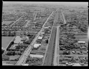 Aerial view of Levin, Horowhenua District, looking north and including Oxford Street (State Highway One), Cambridge Street, and Main Trunk Line