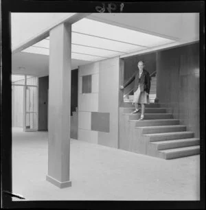 Interior view of Onslow College, on its opening day, a student on the stairs, Johnsonville, Wellington