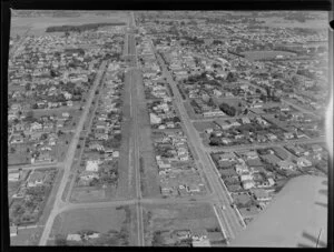 Aerial view of Levin, Horowhenua District, looking south and including Oxford Street (State Highway One), Cambridge Street, and Main Trunk Line