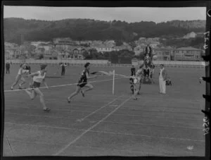 Athletics meeting at Basin Reserve, Wellington, featuring the finish line of a women's running race