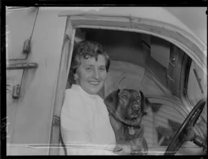 Mrs Thompson and her dog Tina in a vehicle
