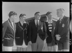 Unidentified captains of the secondary schools rugby union football fifteens talking with Ian Clarke, All Black captain