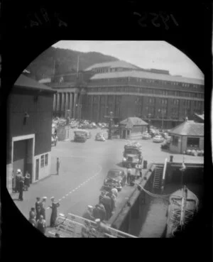 View of Wellington wharf and railway station through a submarine periscope