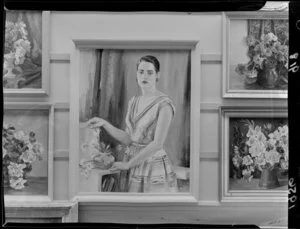 Portrait of a young woman arranging flowers painted by Julia P Lynch in an exhibition at an unidentified art gallery