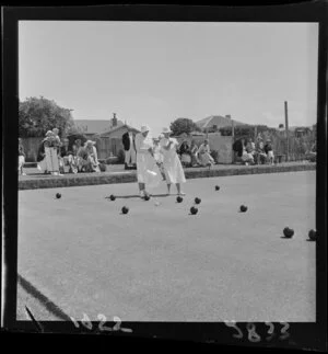Two unidentified women discussing a set in a game of lawn bowls in a Women's Bowling Championship, Miramar, Wellington