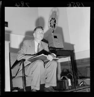 Unidentified man viewing a film at the Film Censor's Office