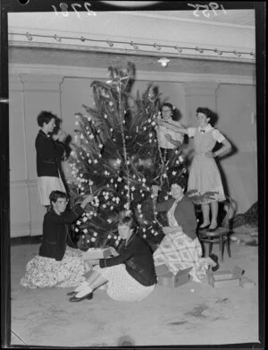 Pupils of Wellington East Girls' College decorating a Christmas tree