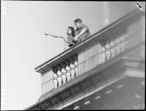 Man and a woman on the Evening Post roof