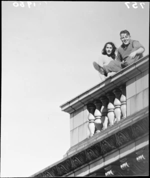 Man and a woman on the Evening Post roof