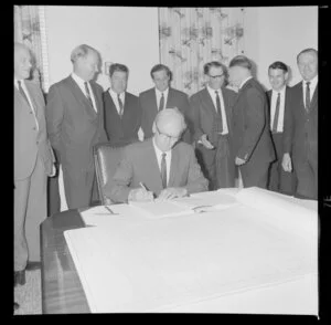 Signing of contract, Reserve Bank of New Zealand, probably for stage 3 of the construction of the Wellington building