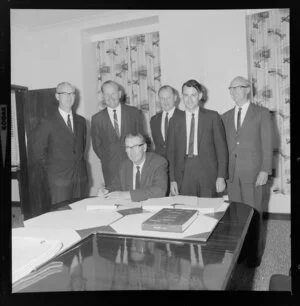 Signing of contract, Reserve Bank of New Zealand, probably for stage 3 of the construction of the Wellington building