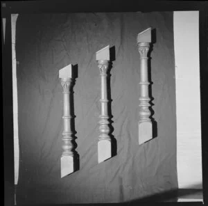 Three ornamental balusters, with carved fern designs imitating corinthian columns, from an unidentified building
