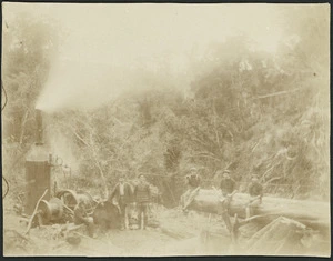 Men by a log hauler
