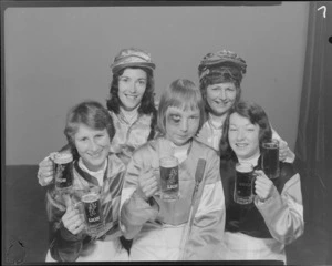 Woman Jockeys drinking lion beer